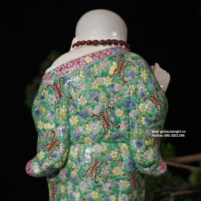 TƯỢNG PHẬT DI LẶC ĐỨNG TRÊN TÚI TIỀN